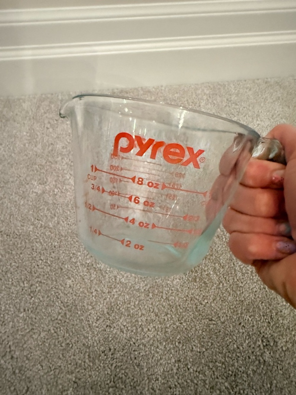 Pyrex Clear Glass Measuring Cup with Orange Logo and Markings